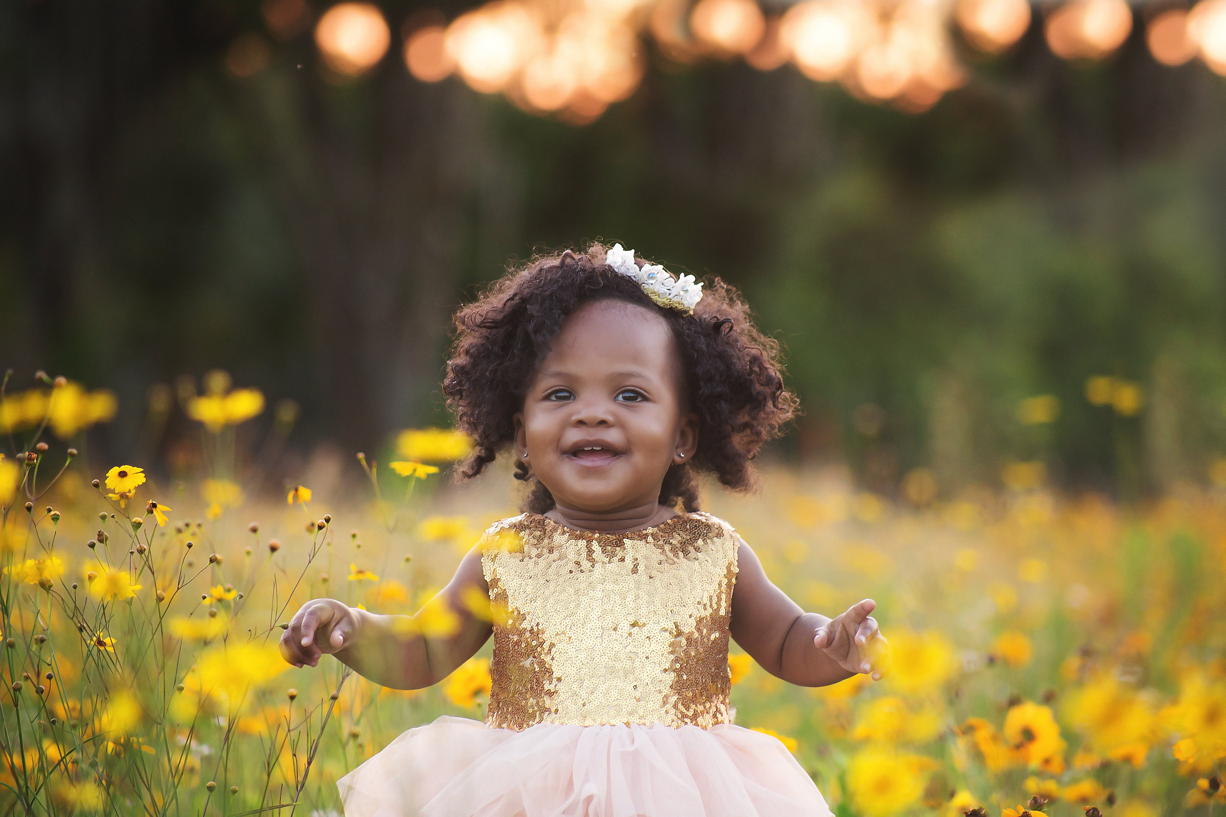 Little girl in a feild of flowers Nashville Tennessee