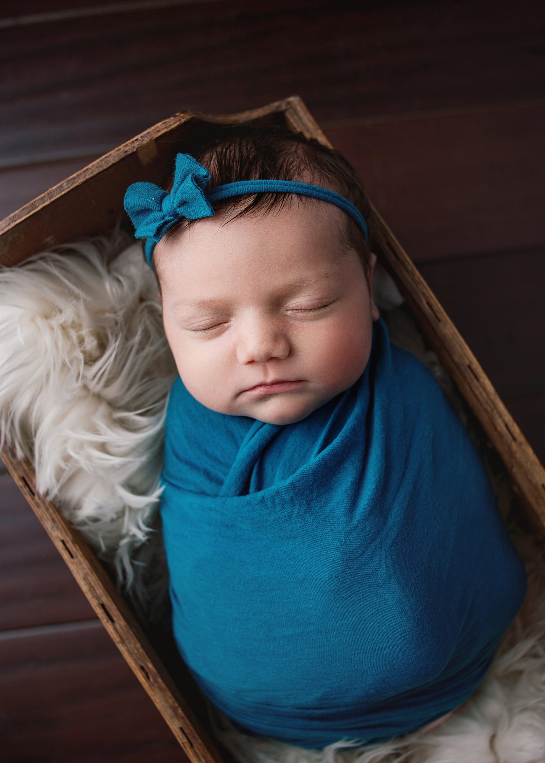 newborn sleeping, blue wrap, headband, Frankline tennessee