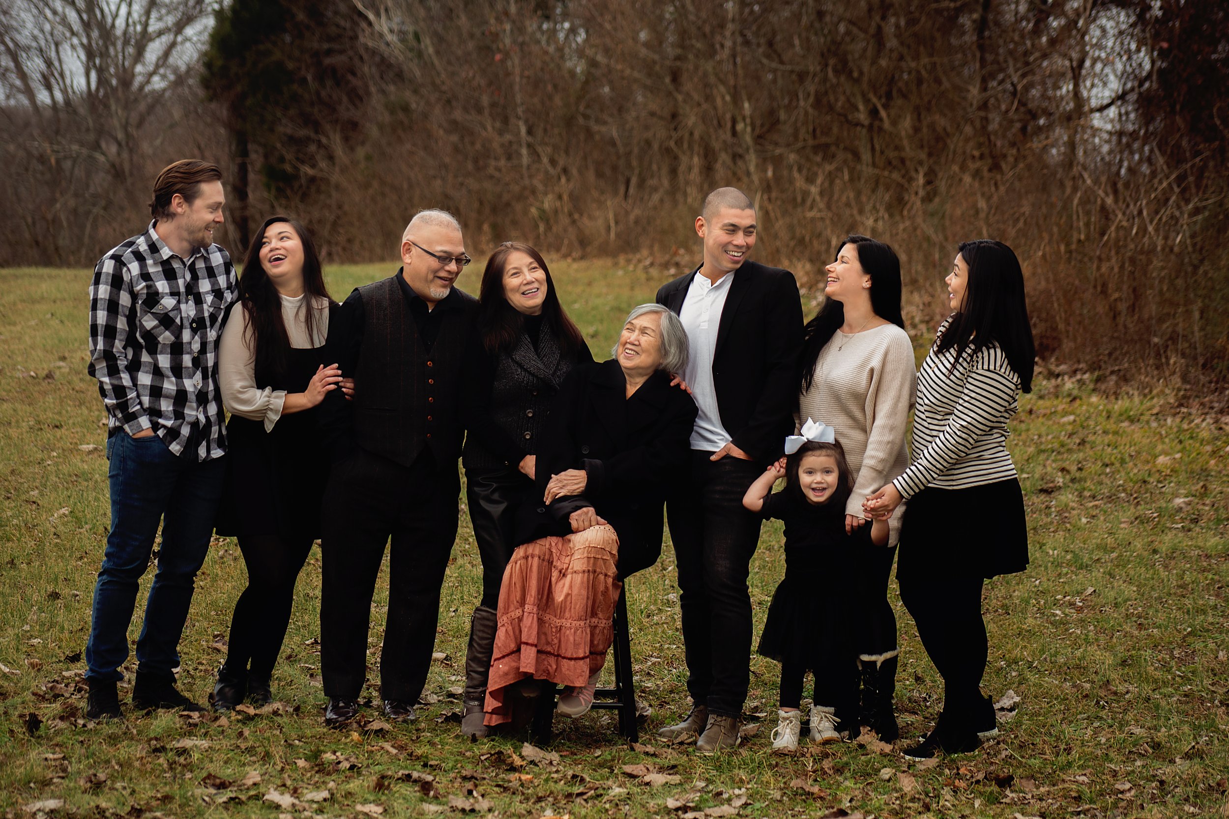 extended family laughing, during family portrait session in mount juliet tennessee