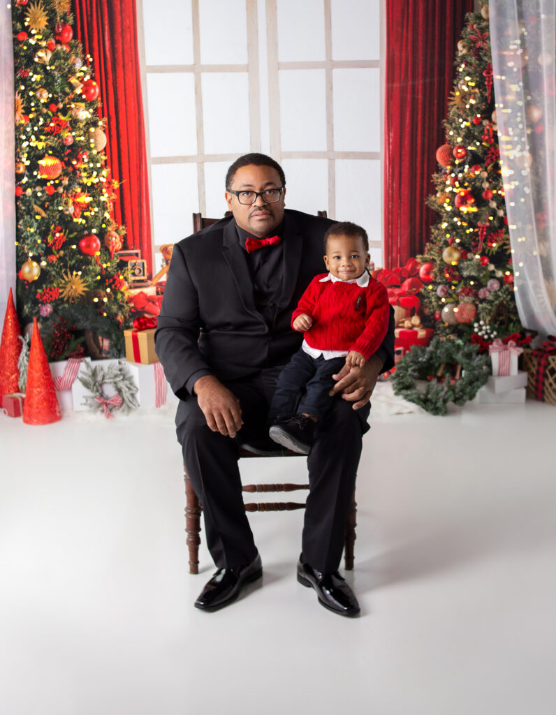 Dad and son during Christmas photos in Mount Juliet TN photography studio with Nashville, TN Photographer 