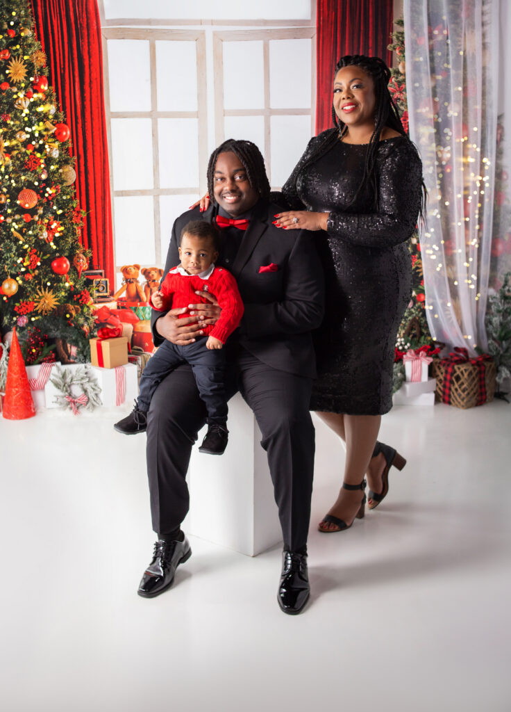 Mother with her sons during Christmas mini session photoshoot in Nashville, TN photography studio 