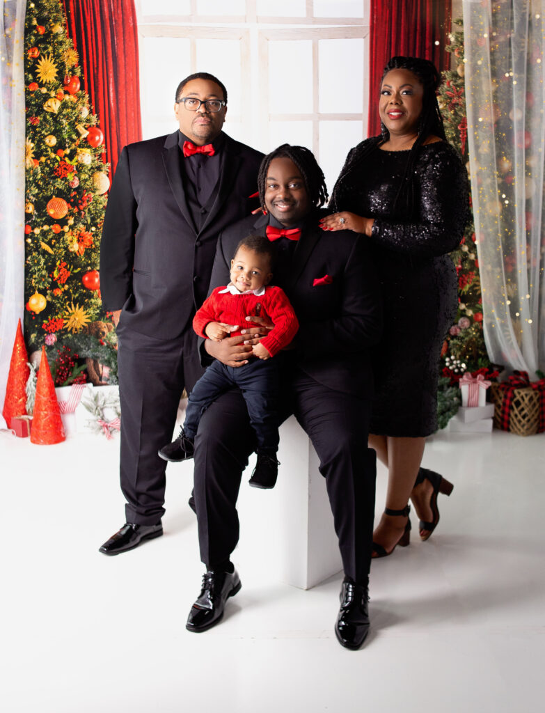 Family photo with Mom and sons and father during Christmas mini session photoshoot with Mount Juliet, TN photographer 