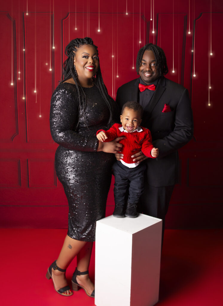 Mom with her two sons, dressed up during Christmas mini session with Nashville, TN Photographer in Mount Juliet, TN photography studio 