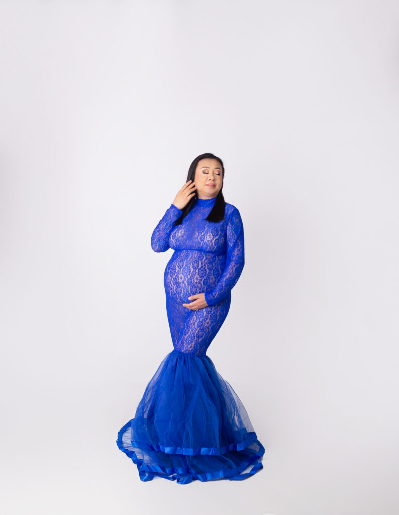 Maternity Photographer capturing pregnant women during photoshoot in Nashville, TN photography studio