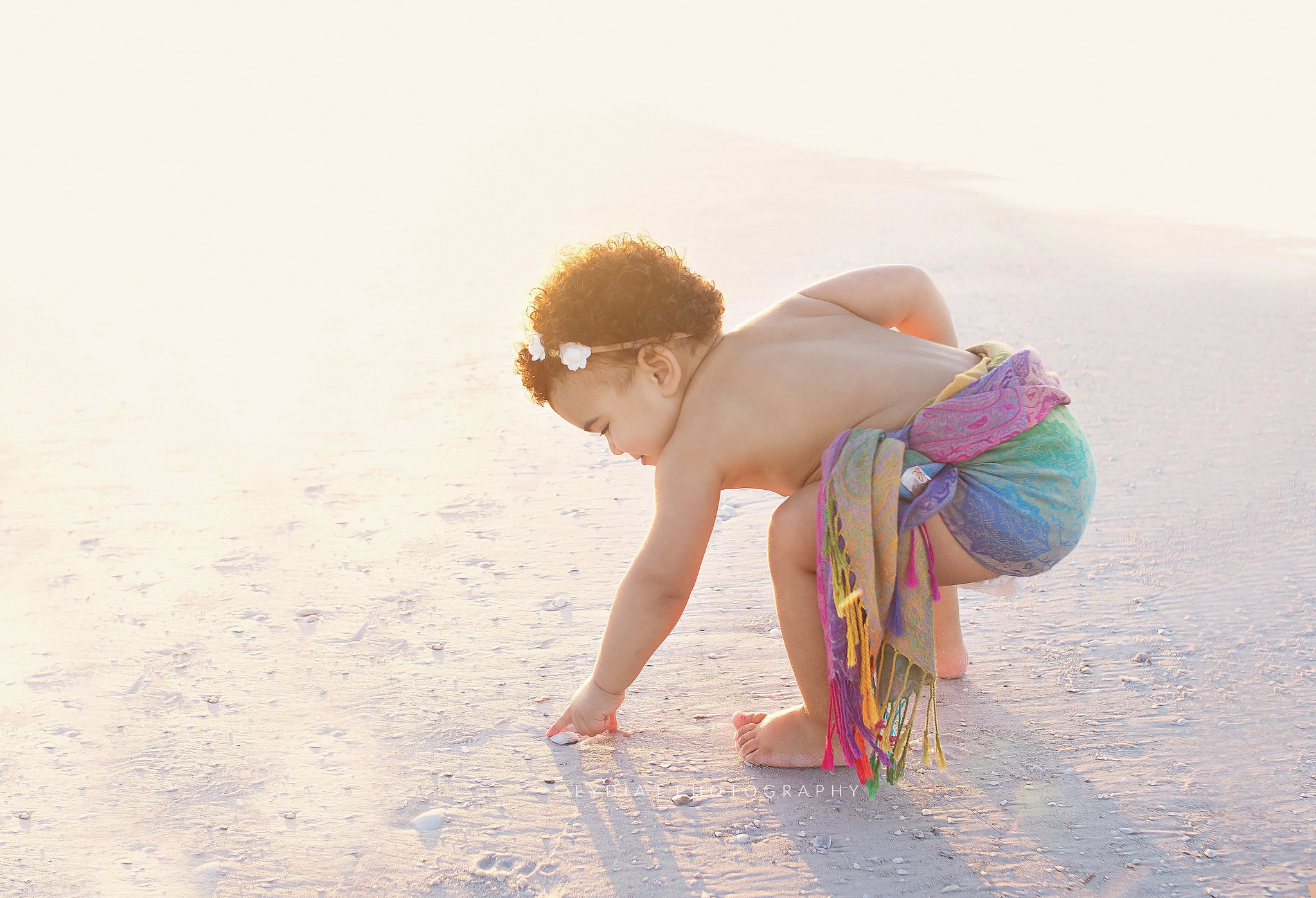 Baby girl on beach during photoshoot with Nashville, TN photographer
